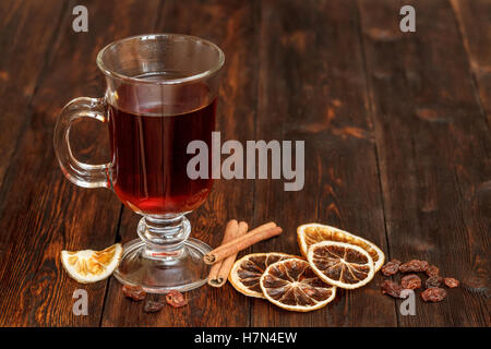 Compote or tea with fruit ingridients, dried orange, cinnamon, raisin Stock Photo