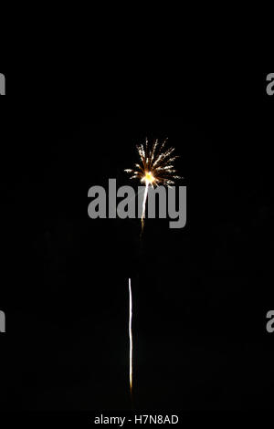 Colorful celebration fireworks isolated on black background. Stock Photo