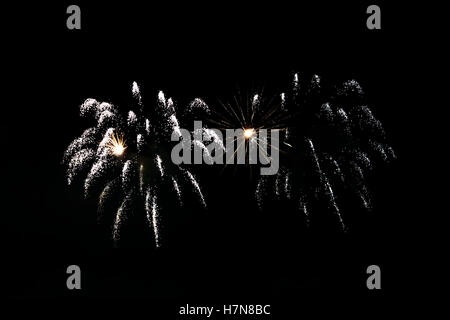 Colorful celebration fireworks isolated on black background. Stock Photo