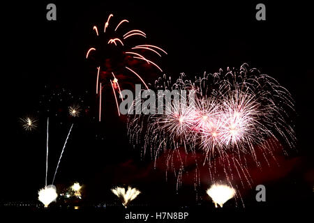 Colorful celebration fireworks isolated on black background. Stock Photo