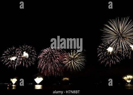 Colorful celebration fireworks isolated on black background. Stock Photo