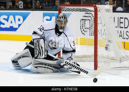 Nov 7, 2011; San Jose, CA, USA; Los Angeles Kings goalie Jonathan Quick (32) stops the puck in front of his goal against the San Jose Sharks during the third period at HP Pavilion.  San Jose defeated Los Angeles 4-2. Stock Photo