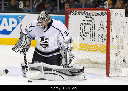 Dec 23, 2011; San Jose, CA, USA; Los Angeles Kings goalie Jonathan Quick (32) saves a shot against the San Jose Sharks during the second period at HP Pavilion. San Jose defeated Los Angeles 2-1 in shootouts. Stock Photo
