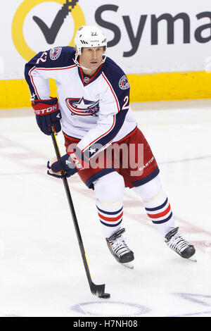 Columbus Blue Jackets left wing Johnny Gaudreau (13) passes the puck as ...
