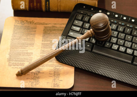 Legal Concept gavel constitution and law books on computer keyboard Stock Photo