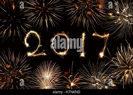 2017 written with sparkles and fireworks Stock Photo