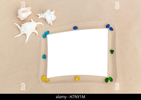 Photo frames with seashells. photo frames on sand with sea shells memories of traveling on the sea Stock Photo