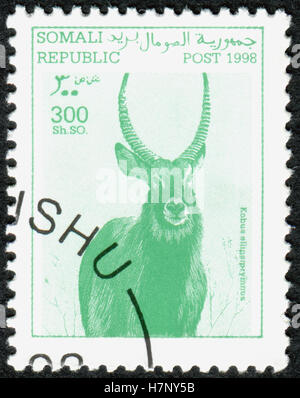 SOMALIA - CIRCA 1998: A stamp printed in Somalia, shows the animal Waterbuck (Kobus ellipsiprymnus), circa 1998 Stock Photo