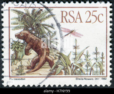 SOUTH AFRICA - CIRCA 1982: A stamp printed in South Africa, shows a Prehistoric Animals (Karoo Fossils), Thrinaxodon, circa 1982 Stock Photo