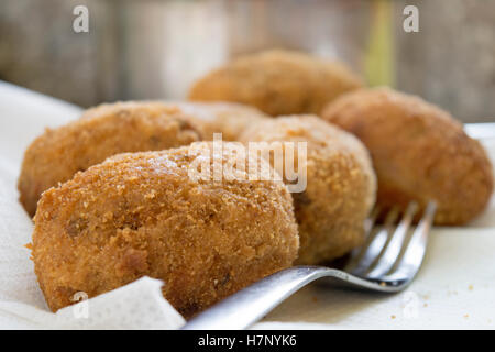 home made fried sicilian arancine or rice balls Stock Photo
