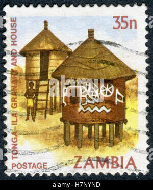 ZAMBIA - CIRCA 1981: A stamp printed in Zambia, is dedicated to Cultural Heritage, shows a Tonga-ila granary, house, circa 1981 Stock Photo
