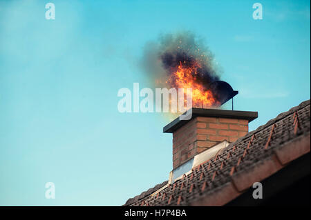Chimney with fire coming out Stock Photo