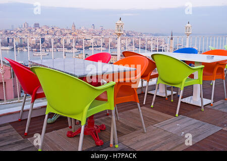 The cozy open air terrace with the scenic aerial view on the old Islanbul and the Golden Horn Bay, Turkey. Stock Photo