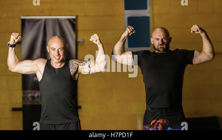 Portrait thai boxers showing their muscles Stock Photo