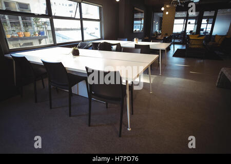 Tables in office cafeteria Stock Photo