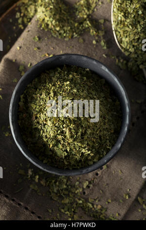 Raw Organic Dry Green Cilantro in a Bowl Stock Photo