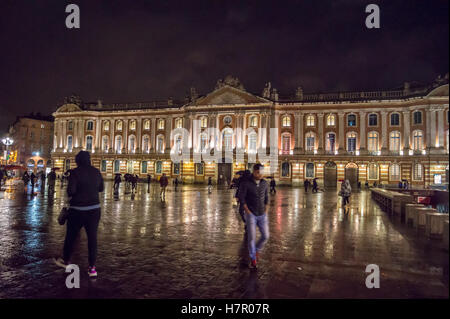 Place du Capitole, town hall at night, Toulouse, Haute-Garonne, Occitanie, France- abstract rain city reflection le Stock Photo