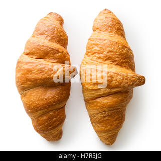 Two tasty buttery croissants isolated on white background. Stock Photo
