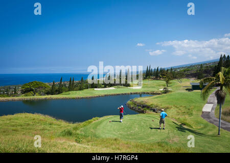 Golfers on golf course, Kona Country Club; Kailua Kona, Island of Hawaii, Hawaii, United States of America Stock Photo