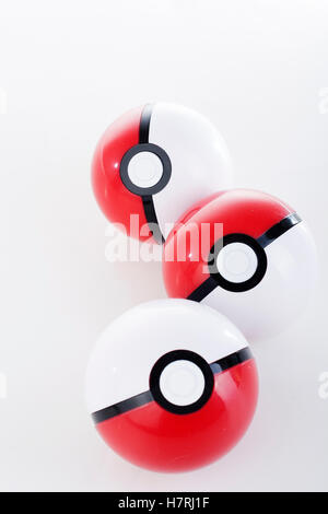 Pokemon ball pokeball on white studio background. Red and white poke ...