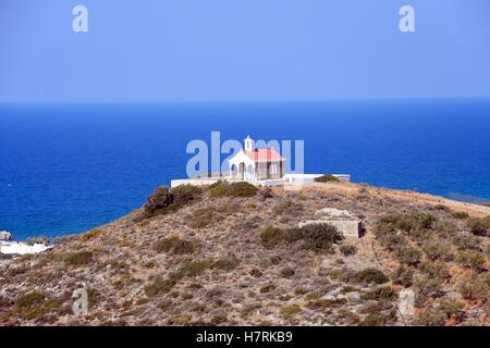 A small chapel on top of a hill with sea views, Milatos, Crete, Europe. Stock Photo