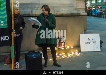 London, UK. 8th October 2016. A vigil outside the Australian High Commission on the anniversary of his death is read the story of Kurdish refugee Fazel Chegeni from Iran, found found dead at the bottom of a cliff on Christmas Island, Australia on November 8 2015. He was in indefinite immigration detention after being involved in a trivial fight years earlier which resulted in his visa as a refugee being revoked. The vigil called for a complete end to immigration detention which leaves many refugees striving to make a new life after persecution without hope. Peter Marshall/Alamy Live News Stock Photo