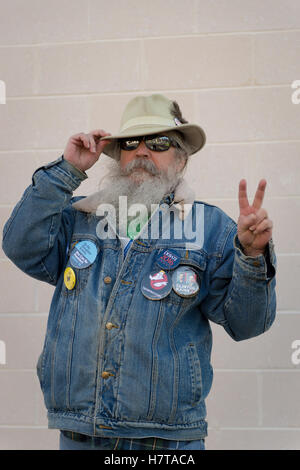 Merrick, New York, USA. October 23, 2016. FRED S. CHANDLER, 66, of N. Bellmore, wears Hillary Clinton political buttons at rally Stock Photo