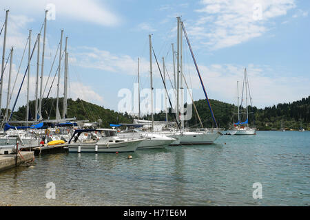 Nidri, GREECE, May 11, 2013: Landscape with green island, mountains and yachts in Ionian sea, Greece. Stock Photo