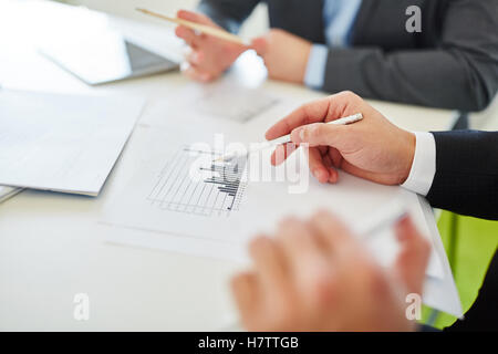 Graph statistics analysis in business meeting Stock Photo