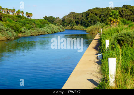 HADERA, ISRAEL - SEPTEMBER 27, 2015: View of Hadera River (Nahal Hadera) Park, with local fishermen, Northern Israel Stock Photo