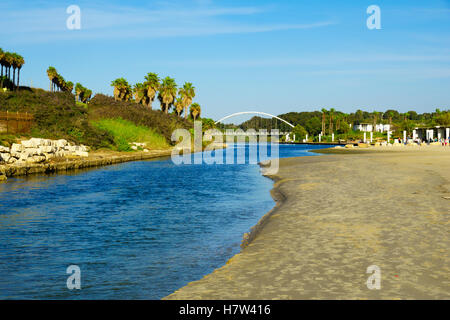 HADERA, ISRAEL - SEPTEMBER 27, 2015: View of Hadera River (Nahal Hadera) Park, the Harp (Nevel) Bridge, and visitors. Northern I Stock Photo