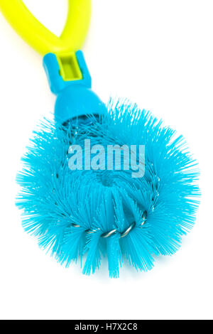 blue dishwashing brush on a white background Stock Photo