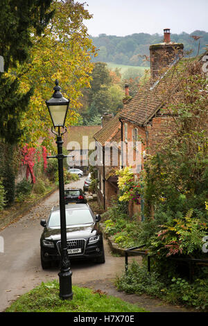 UK, England, Buckinghamshire, West Wycombe, Church Lane, brick built houses on hill Stock Photo