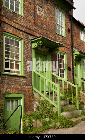 UK, England, Buckinghamshire, West Wycombe, Church Lane, steps up to door of 1722 brick built listed house Stock Photo