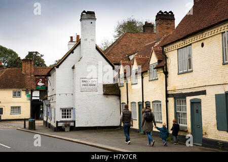 England, Buckinghamshire, West Wycombe, High Street, visitors walking towards Swan Inn Stock Photo