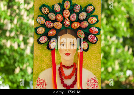 Kyiv, Ukraine, Sophia Square, 2 of May 2016. Easter composition.  Ukrainian Easter portrait of a woman in traditional suit and c Stock Photo