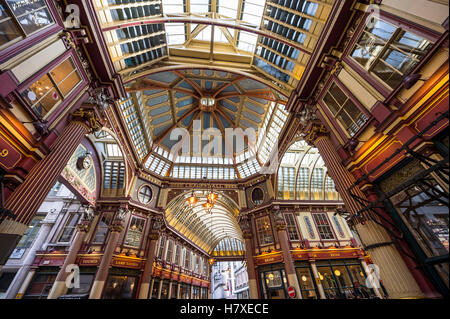 LONDON - NOVEMBER 3, 2016: Autumn light filters through the Victorian arcade of the Leadenhall Market, built in the 19th century Stock Photo