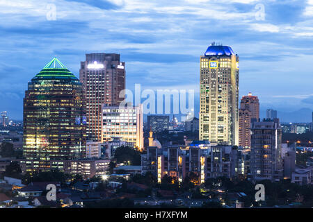 Jakarta skyline around the central business district at night in Indonesia capital city. Stock Photo