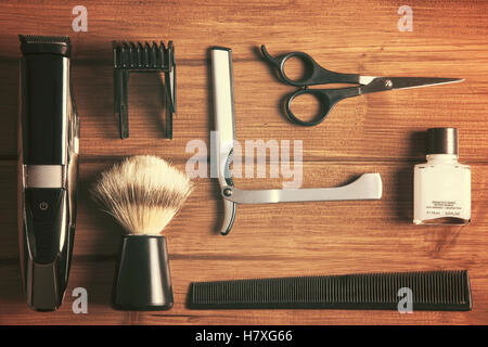 overhead of barber tools on wood top Stock Photo