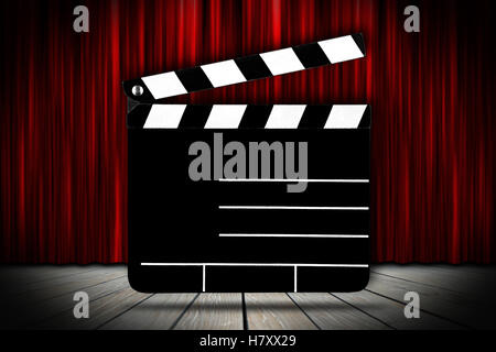cinema voucher pattern with empty blank clapperboard slate on theater stage with red curtain Stock Photo