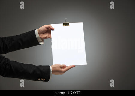 Male hands holding empty blank Stock Photo