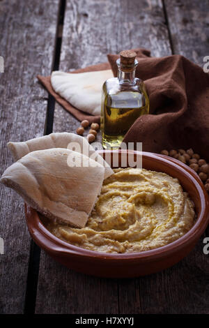 Traditional hummus and pita bread. Selective focus Stock Photo