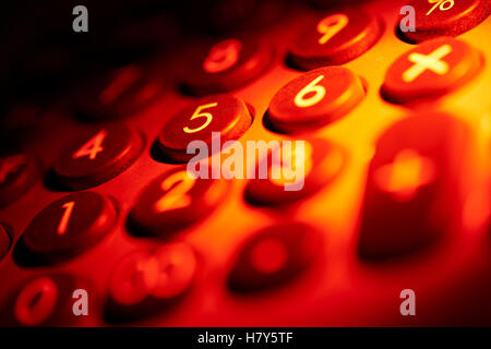 full frame red illuminated numeric keypad detail Stock Photo