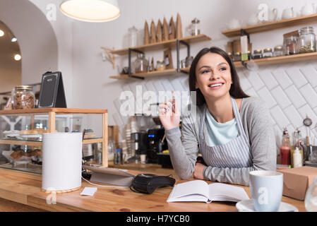 Beautiful barista woman during work in her street coffee shop Stock ...