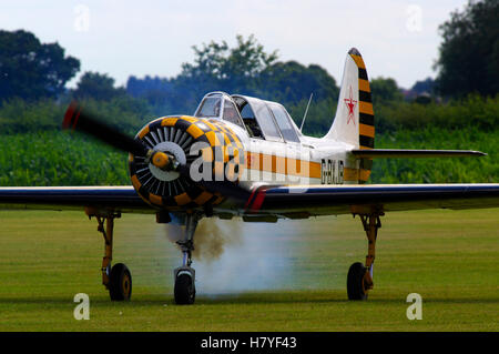 Yakovlev Yak 52 G-BXJB, at East Kirkby Stock Photo