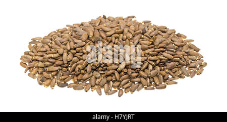A portion of organic milk thistle seeds isolated on a white background. Stock Photo