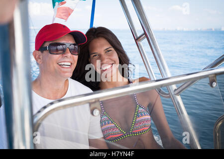 Causasian man and hispanic woman enjoying boat ride. Banderas Bay - Pacific Ocean, Puerto Vallarta, Mexico Stock Photo