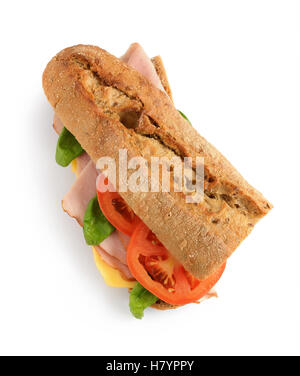 Sandwich with ham, tomato, cheese and basil isolated on white background Stock Photo