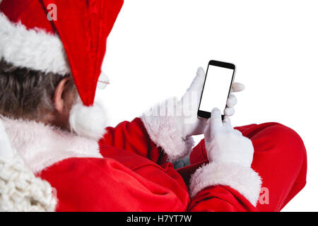 Santa claus using mobile phone Stock Photo