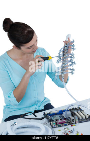 Female computer engineer repairing computer motherboard Stock Photo